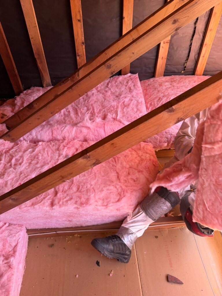pink fibreglass insulation installed between attic floor joists by atticity in the Bay Area CA